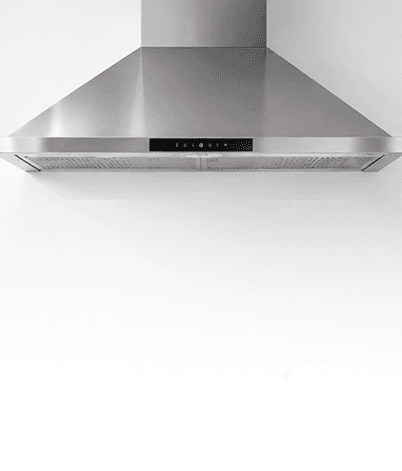 Modern Indian kitchen with chimney, hob and stainless steel cookware